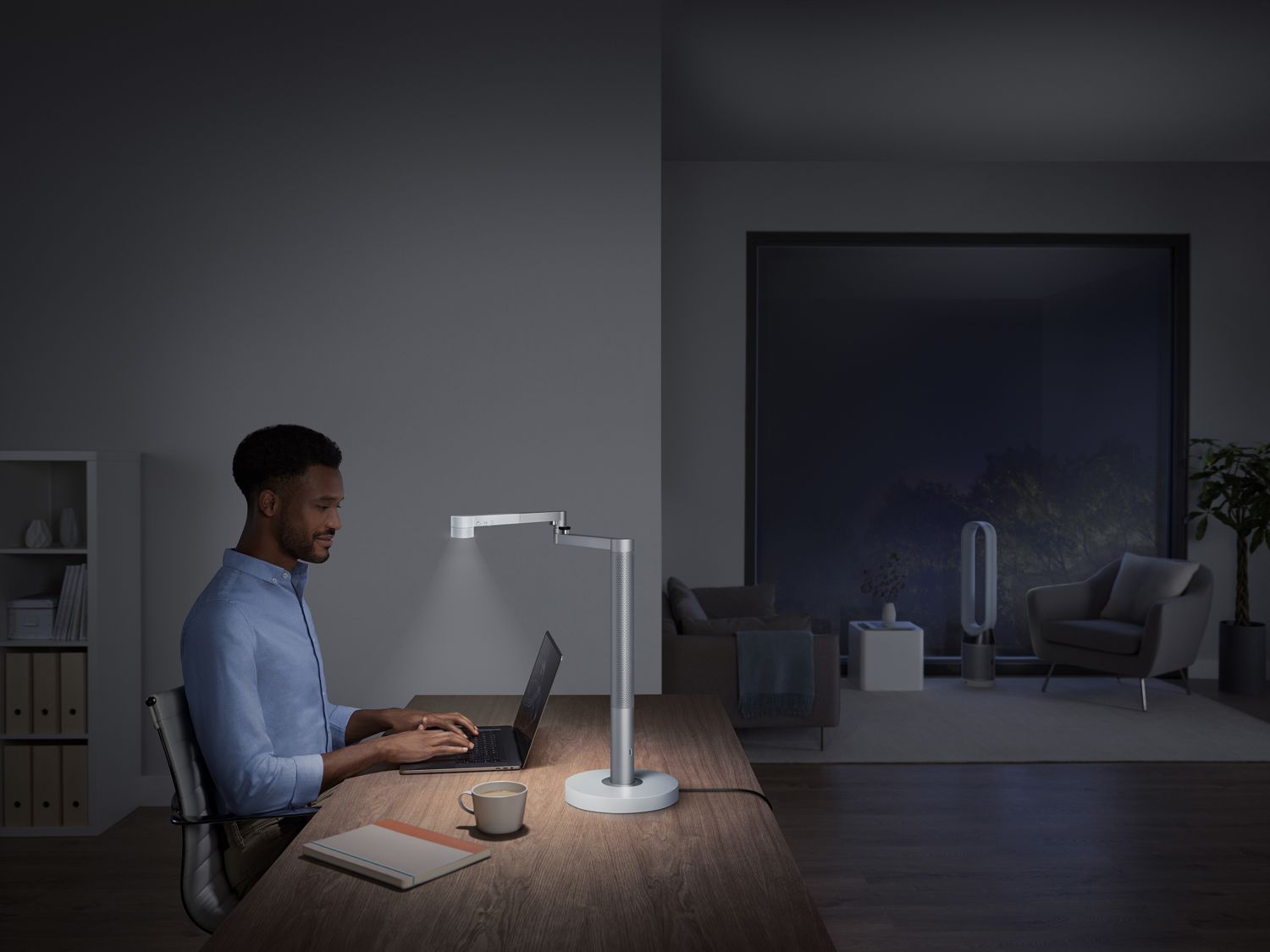 Powerful task light for a man to use his laptop